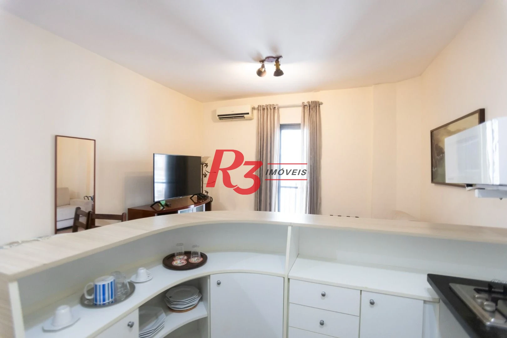 Flat com 1 dormitório à venda, 50 m² por R$ 270.000,00 - Gonzaga - Santos/SP