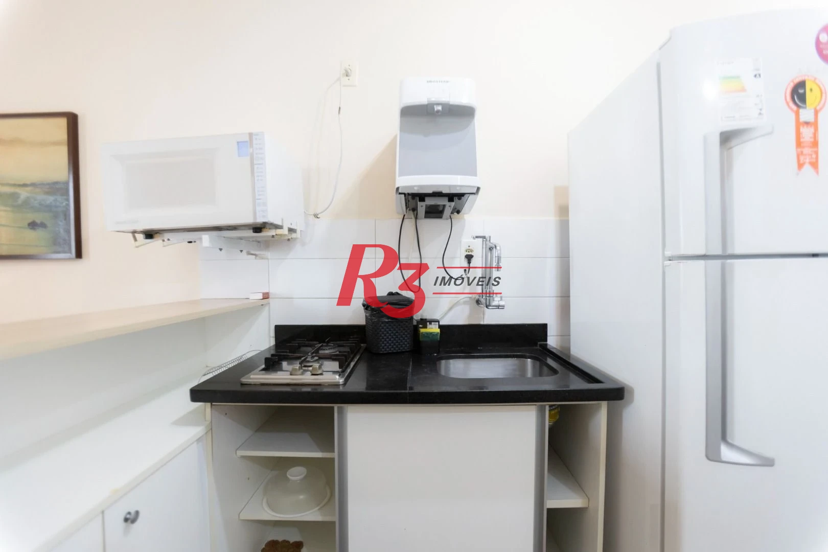 Flat com 1 dormitório à venda, 50 m² por R$ 270.000,00 - Gonzaga - Santos/SP