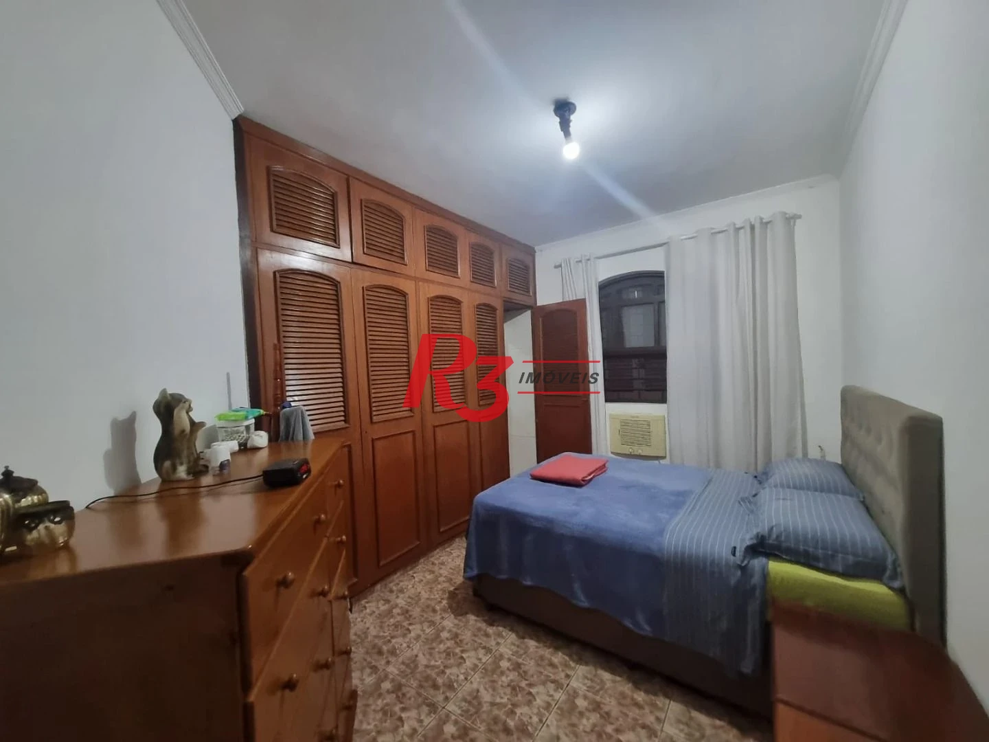 Casa com 3 dormitórios à venda, 150 m² por R$ 1.350.000,00 - Ponta da Praia - Santos/SP