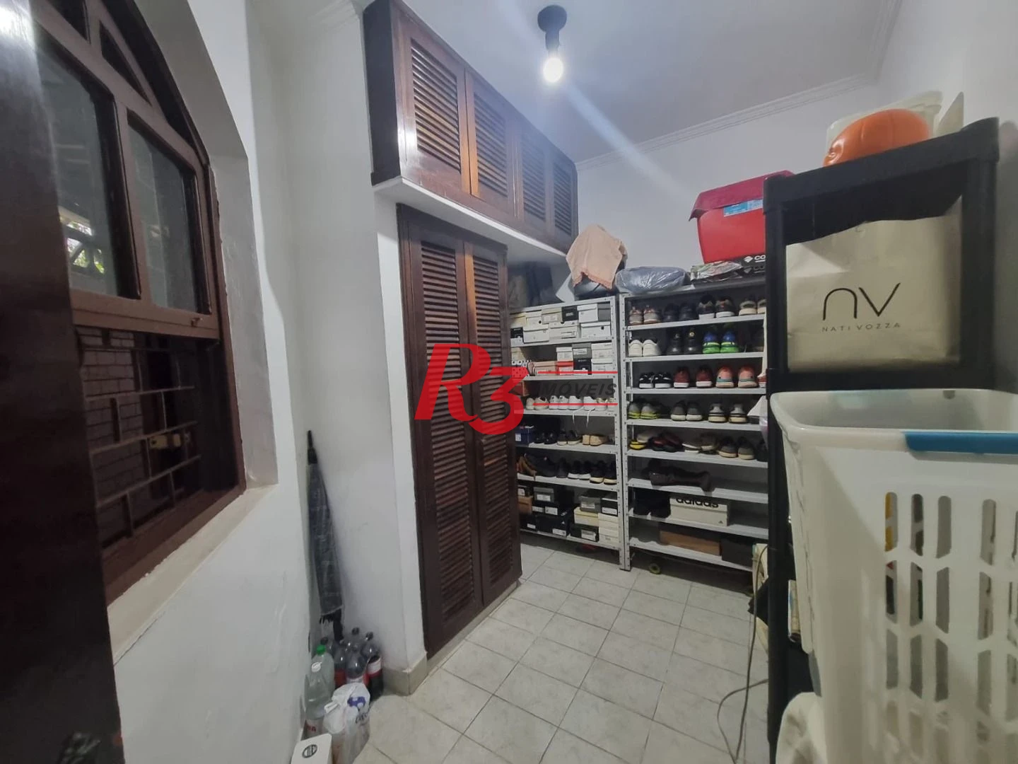 Casa com 3 dormitórios à venda, 150 m² por R$ 1.350.000,00 - Ponta da Praia - Santos/SP