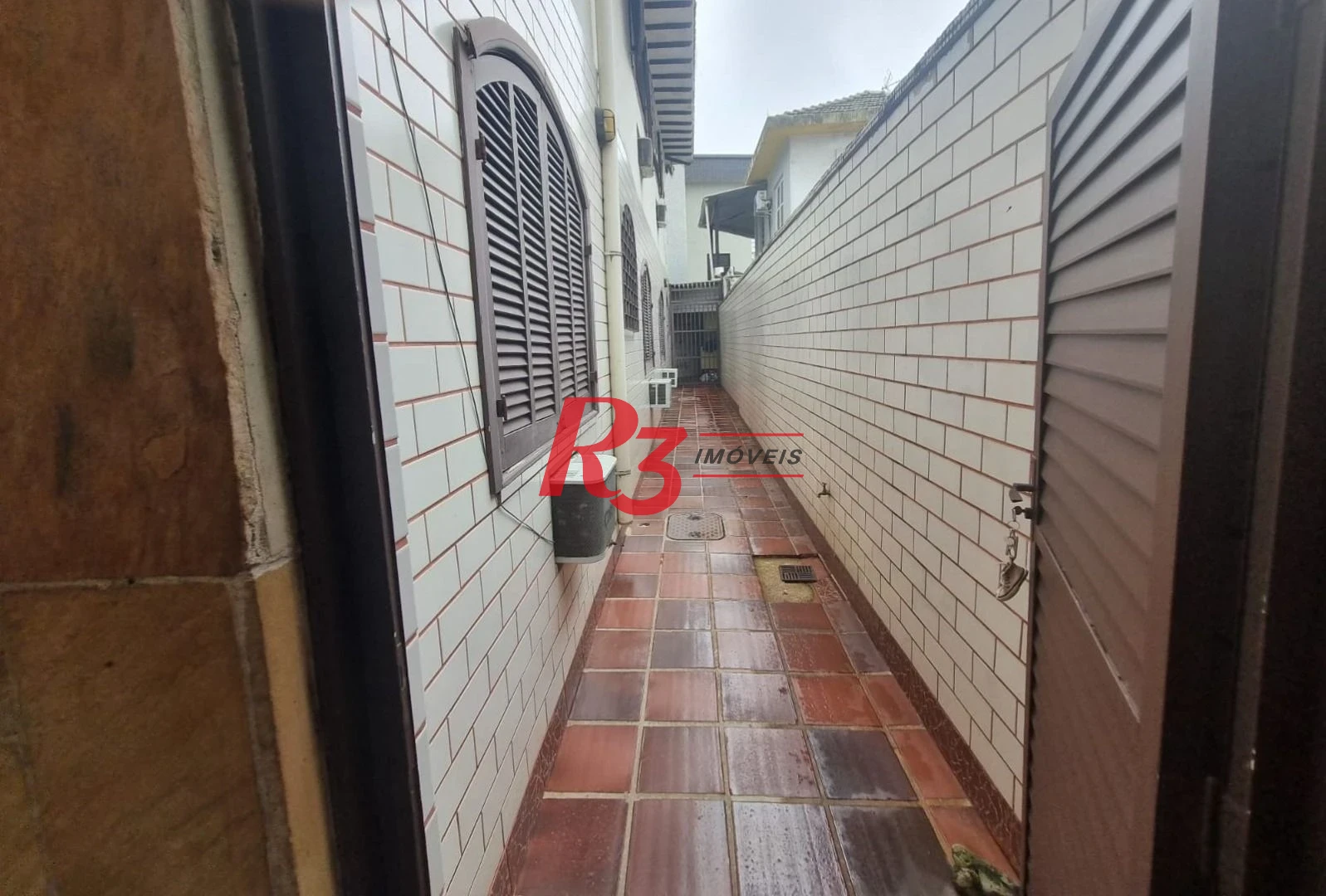 Casa com 3 dormitórios à venda, 150 m² por R$ 1.350.000,00 - Ponta da Praia - Santos/SP