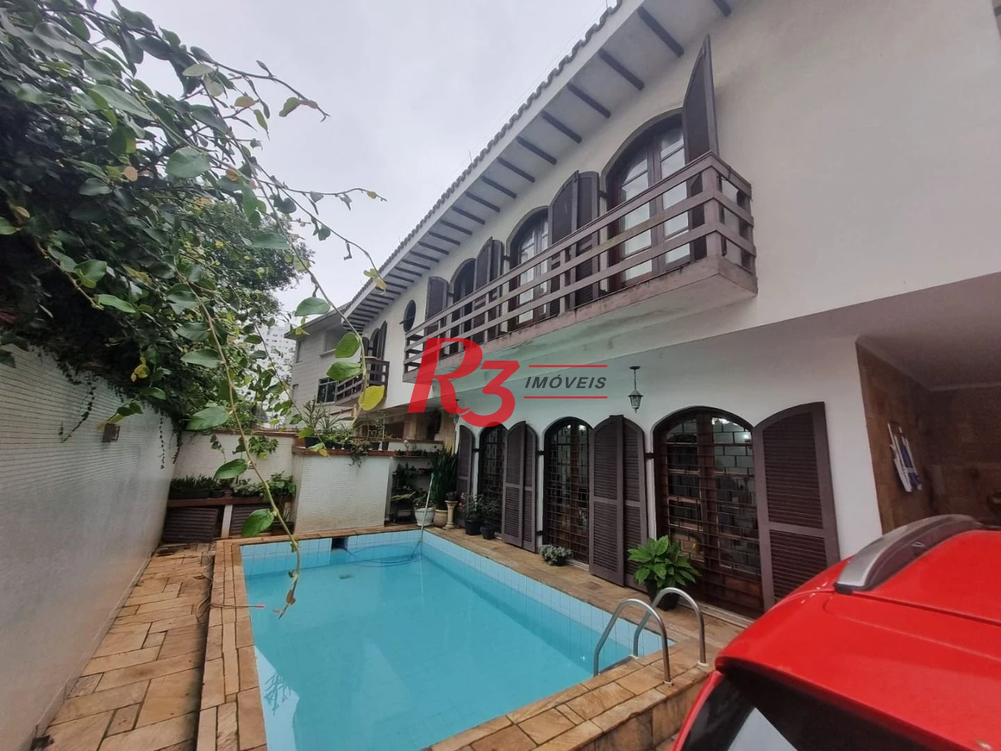Casa com 3 dormitórios à venda, 150 m² por R$ 1.350.000,00 - Ponta da Praia - Santos/SP