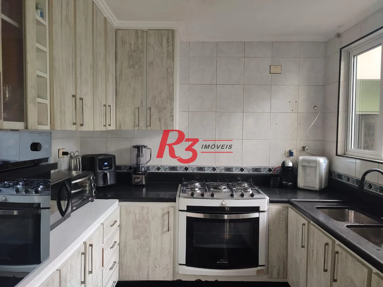 Casa com 3 dormitórios à venda, 290 m² por R$ 2.200.000,00 - Boqueirão - Santos/SP