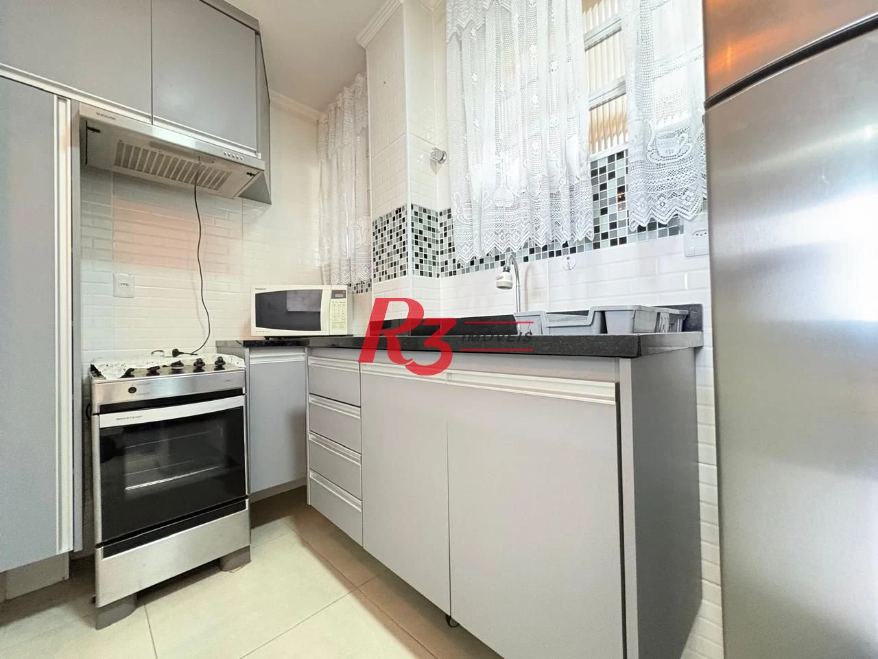 Apartamento com 1 dormitório à venda, 55 m² por R$ 465.000,00 - Embaré - Santos/SP