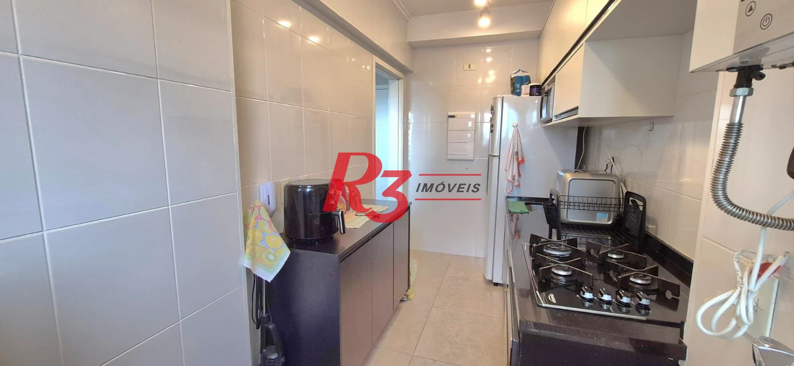 Apartamento com 2 dormitórios à venda, 63 m² por R$ 770.000,00 - Campo Grande - Santos/SP
