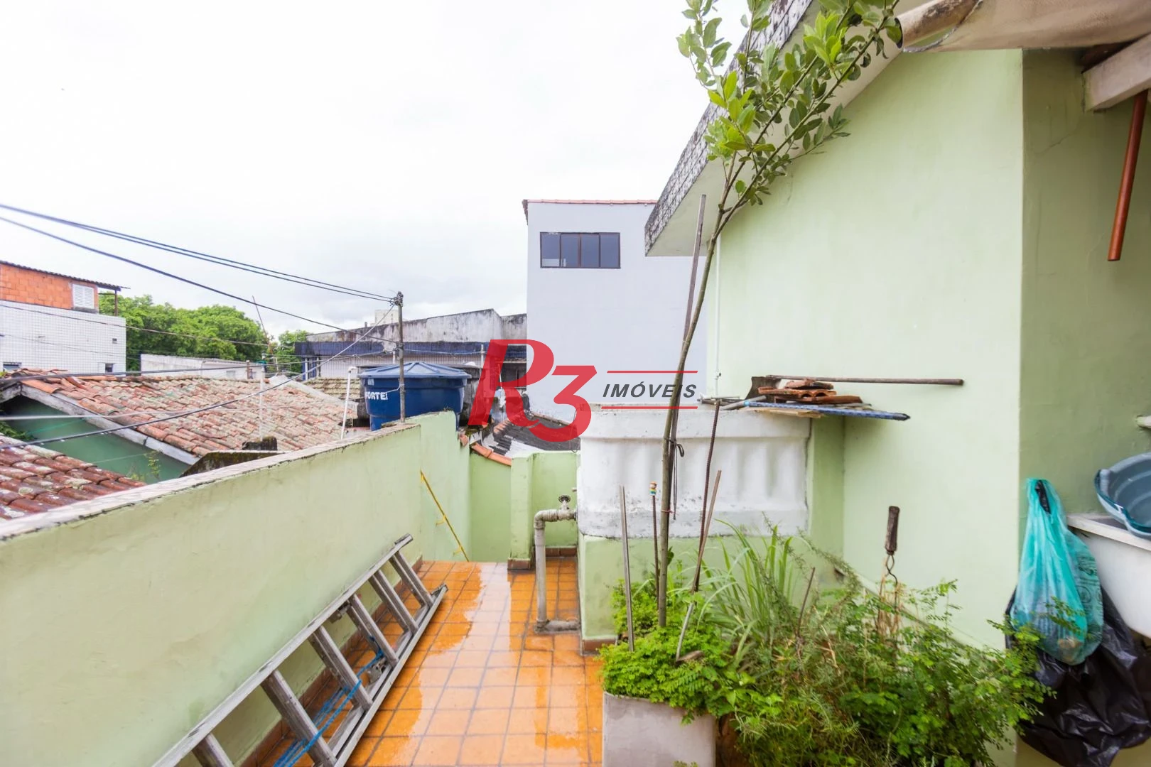 Sobrado à venda, 117 m² por R$ 470.000,00 - Estuário - Santos/SP
