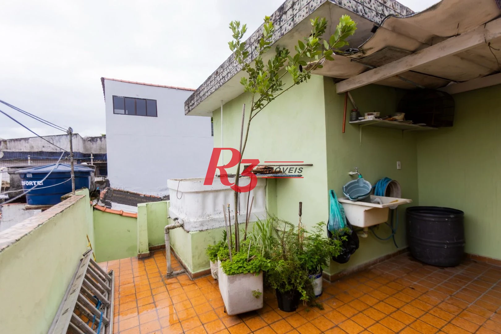 Sobrado à venda, 117 m² por R$ 470.000,00 - Estuário - Santos/SP