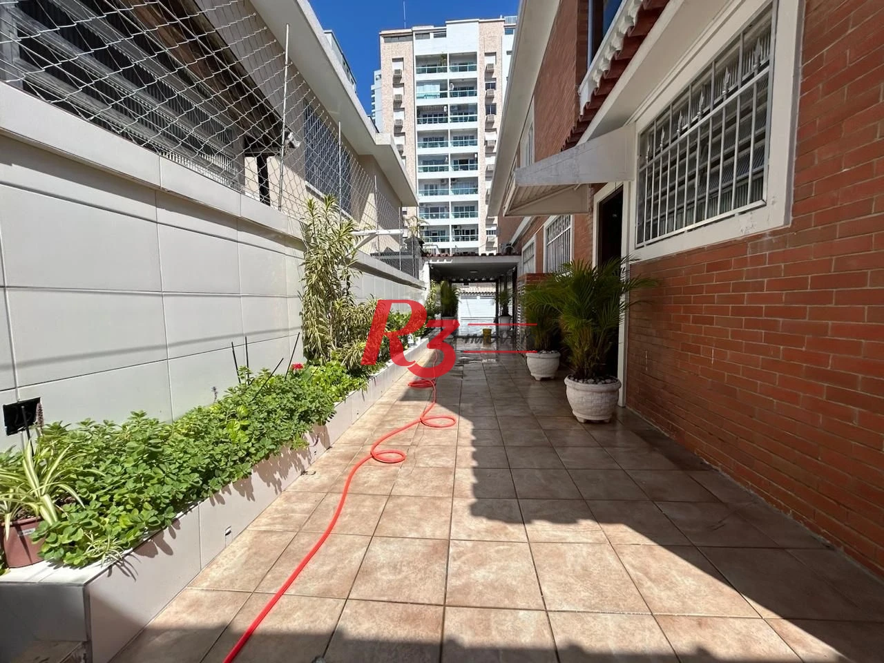 Casa à venda, 350 m² por R$ 6.390.000,00 - Ponta da Praia - Santos/SP