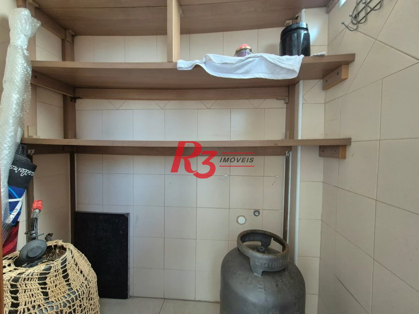 Casa com 3 dormitórios à venda, 165 m² por R$ 1.060.000,00 - Campo Grande - Santos/SP