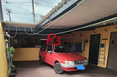 Casa com 3 dormitórios à venda, 200 m² por R$ 650.000,00 - Areia Branca - Santos/SP