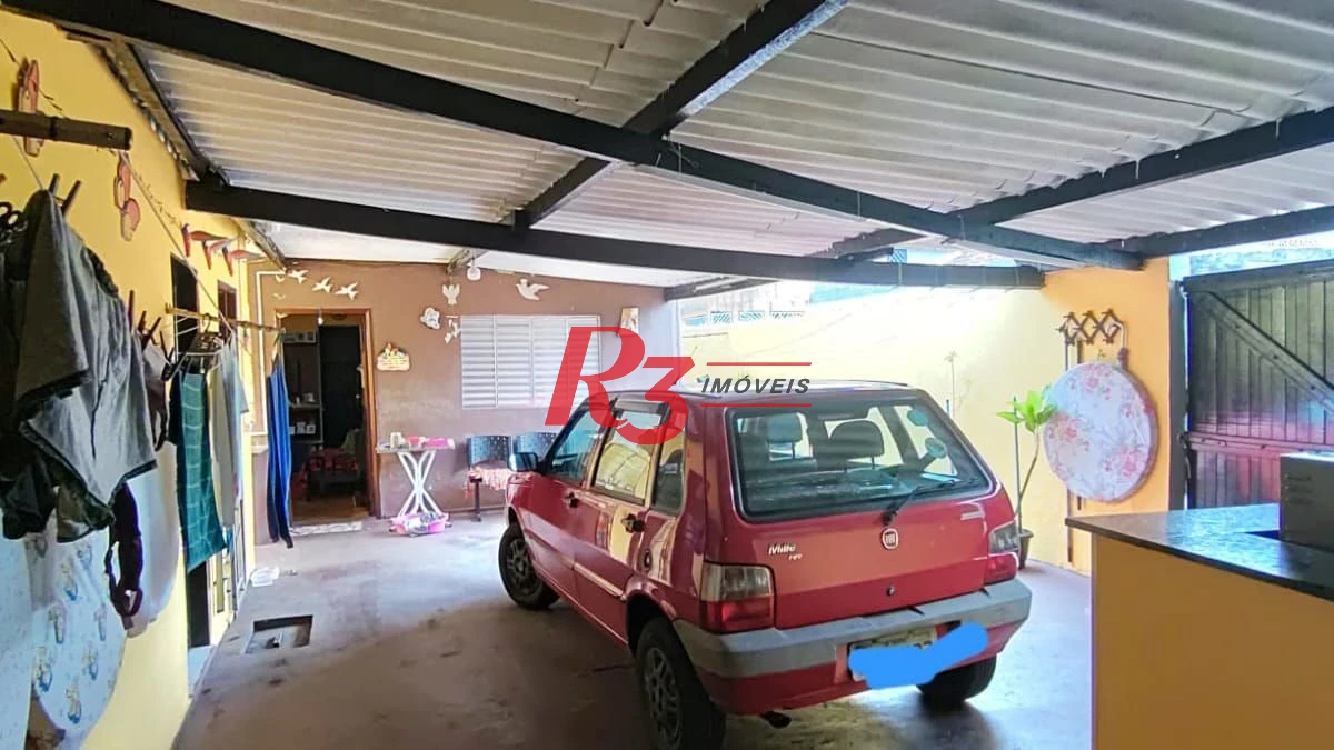 Casa com 3 dormitórios à venda, 200 m² por R$ 650.000,00 - Areia Branca - Santos/SP