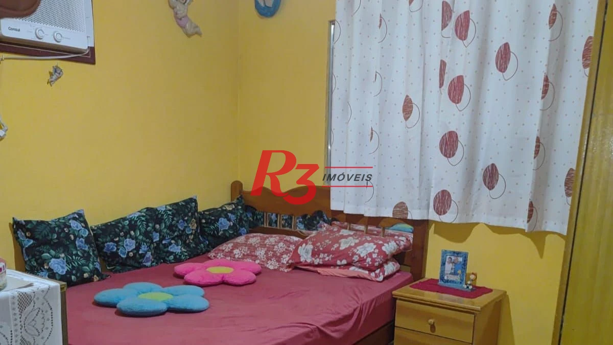 Casa com 3 dormitórios à venda, 200 m² por R$ 650.000,00 - Areia Branca - Santos/SP