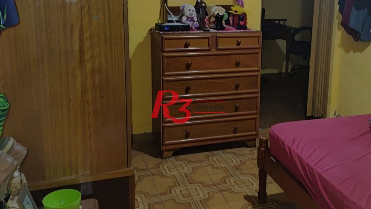 Casa com 3 dormitórios à venda, 200 m² por R$ 650.000,00 - Areia Branca - Santos/SP