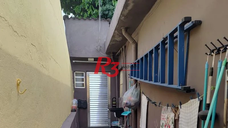 Casa com 3 dormitórios à venda, 200 m² por R$ 650.000,00 - Areia Branca - Santos/SP