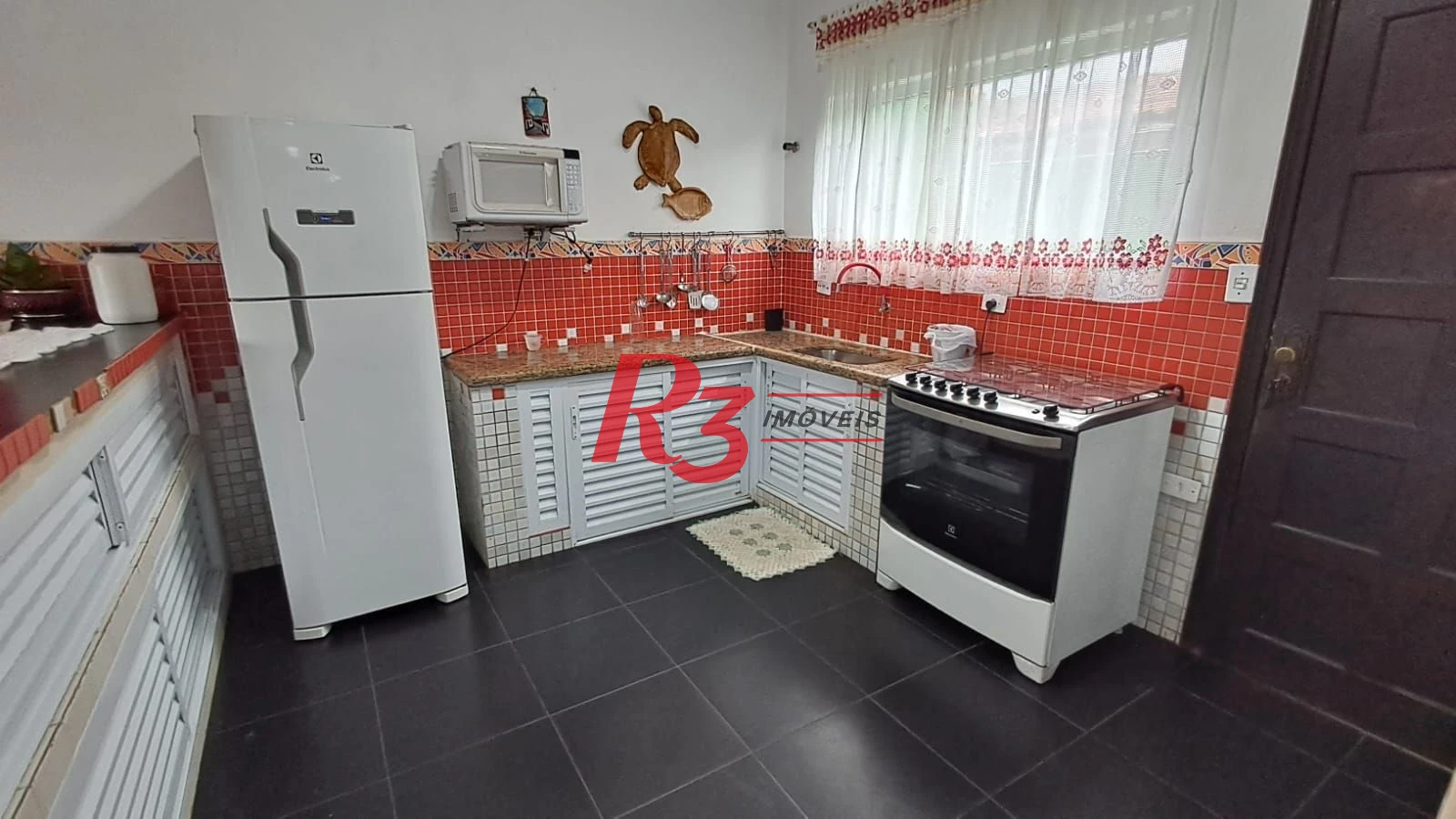 Sobrado à venda, 268 m² por R$ 1.200.000,00 - Solemar - Praia Grande/SP