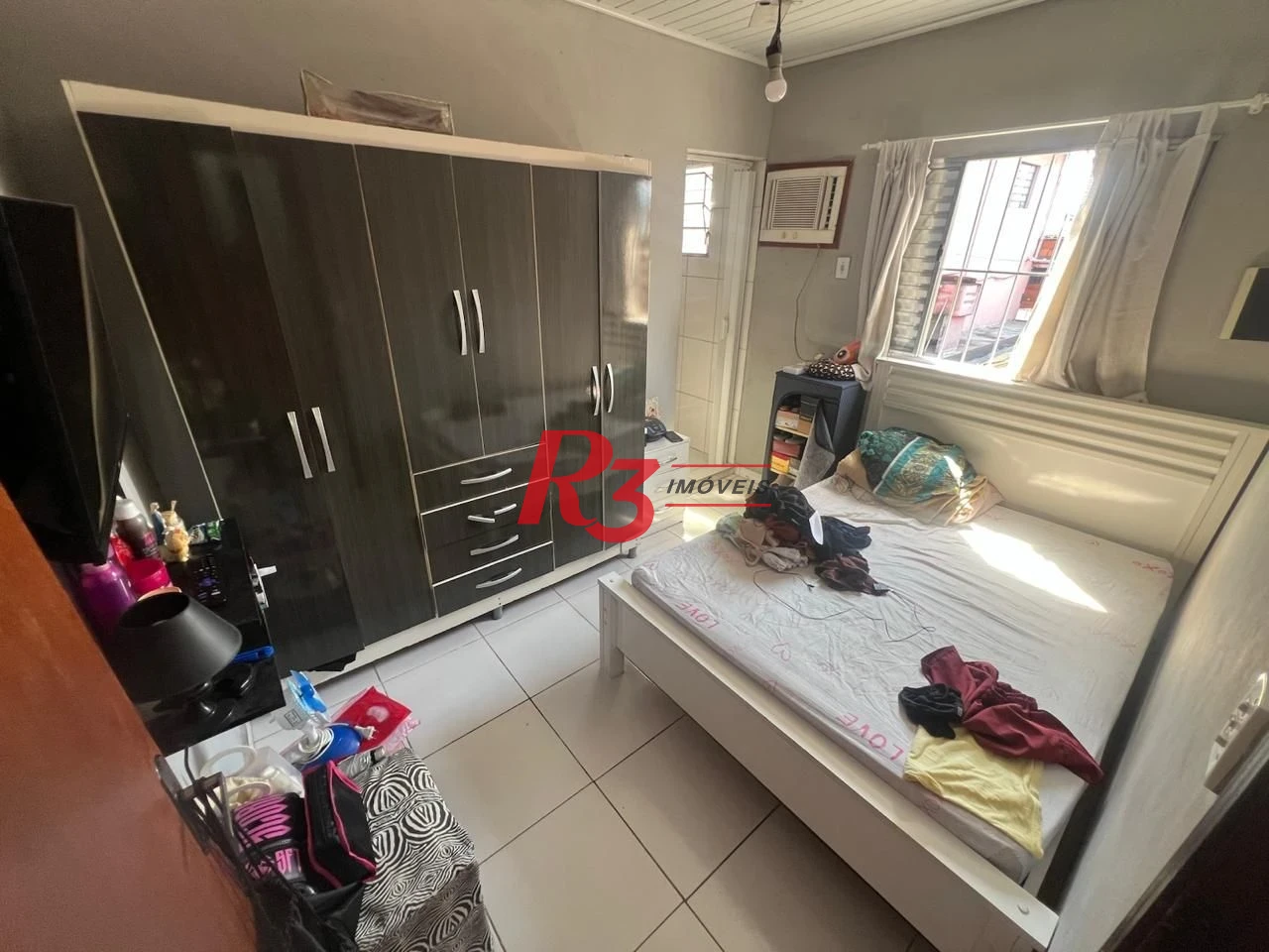 Casa à venda, 199 m² por R$ 540.000,00 - Rádio Club - Santos/SP