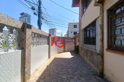 Sobrado com 3 dormitórios à venda, 114 m² por R$ 850.000,00 - Encruzilhada - Santos/SP