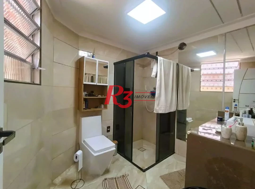 Sobrado com 3 dormitórios à venda, 114 m² por R$ 850.000,00 - Encruzilhada - Santos/SP