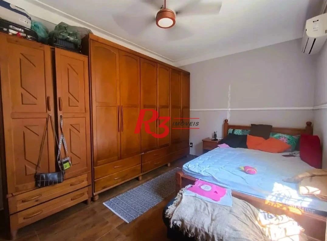 Sobrado com 3 dormitórios à venda, 114 m² por R$ 850.000,00 - Encruzilhada - Santos/SP