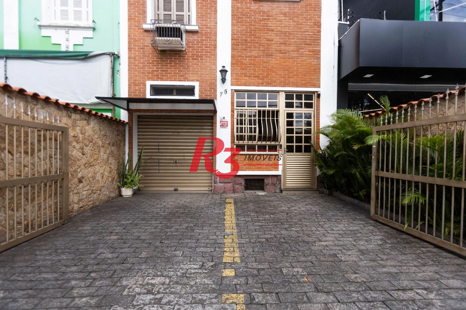 Sobrado com 4 dormitórios, 227 m² - venda por R$ 2.000.000,00 ou aluguel por R$ 9.605,06/mês - Vila Belmiro - Santos/SP