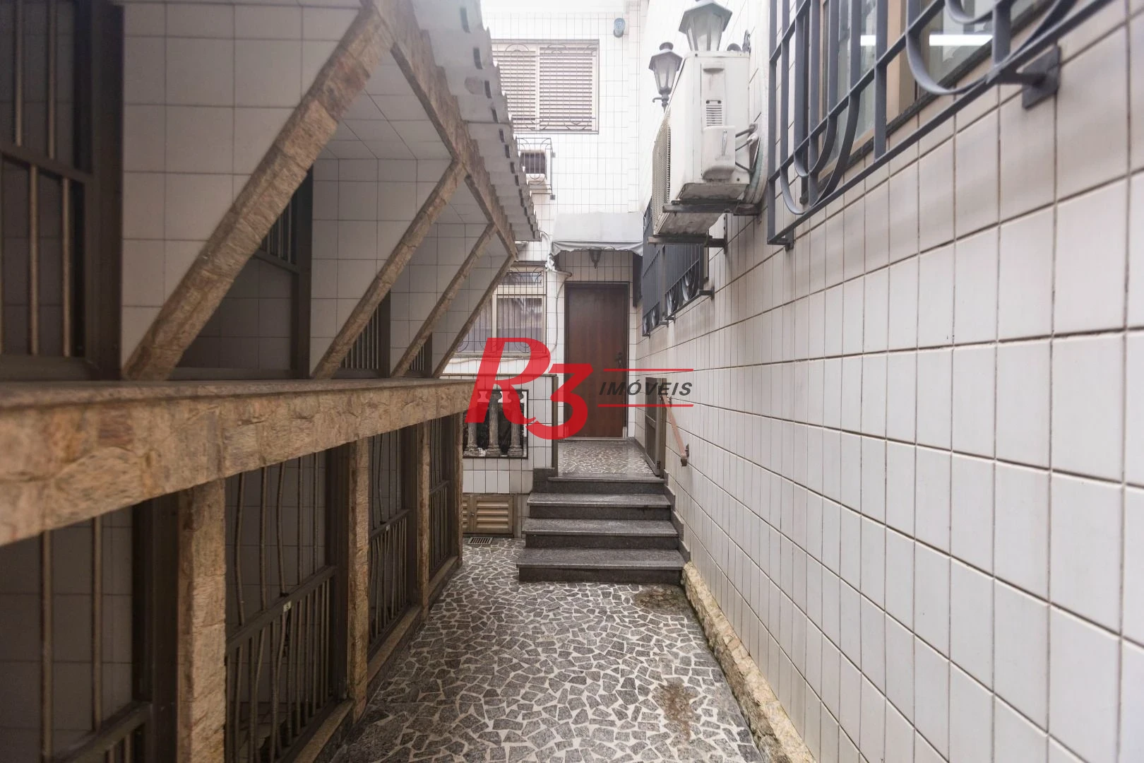 Sobrado com 4 dormitórios, 227 m² - venda por R$ 2.000.000,00 ou aluguel por R$ 9.605,06/mês - Vila Belmiro - Santos/SP