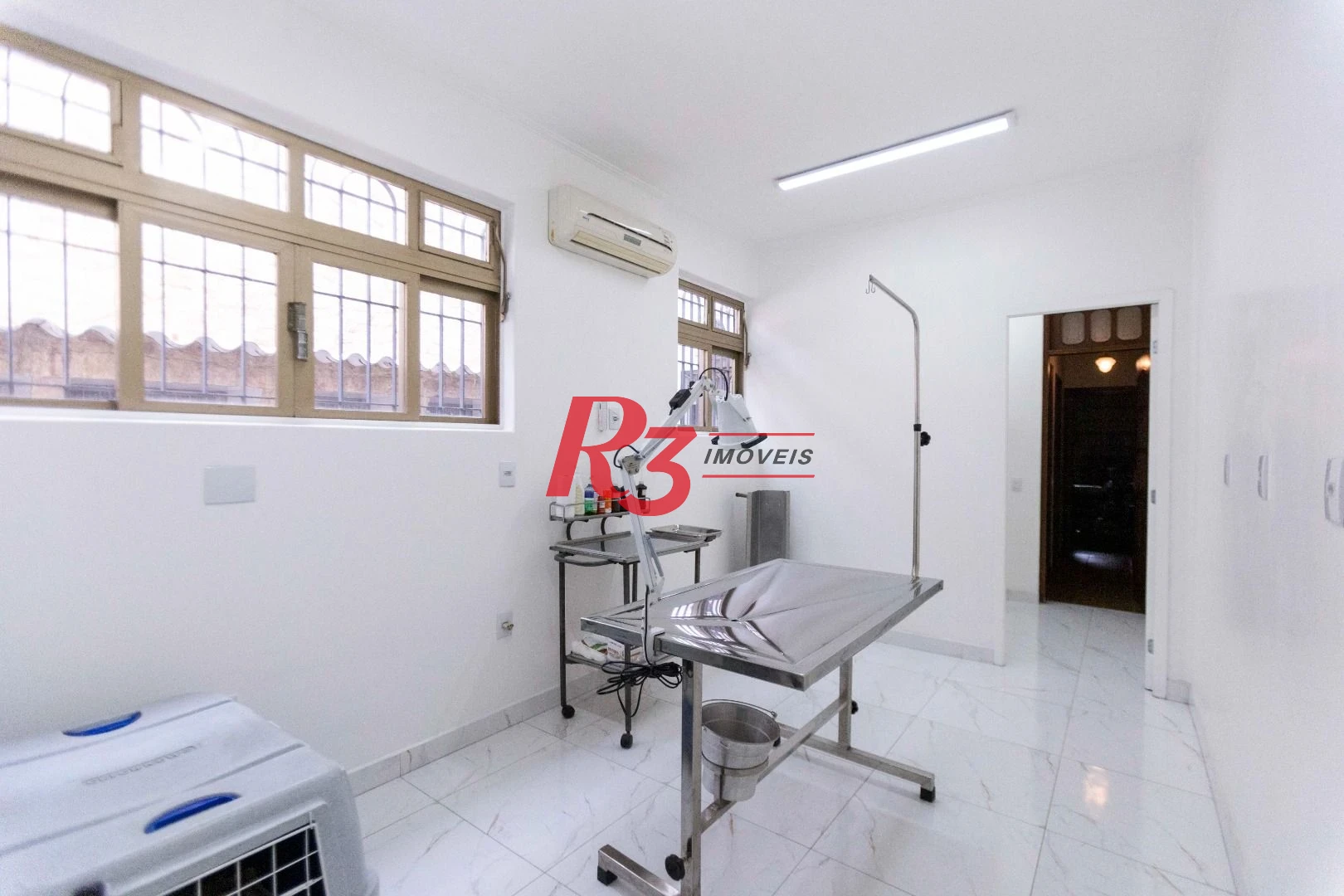 Sobrado com 4 dormitórios, 227 m² - venda por R$ 2.000.000,00 ou aluguel por R$ 9.605,06/mês - Vila Belmiro - Santos/SP