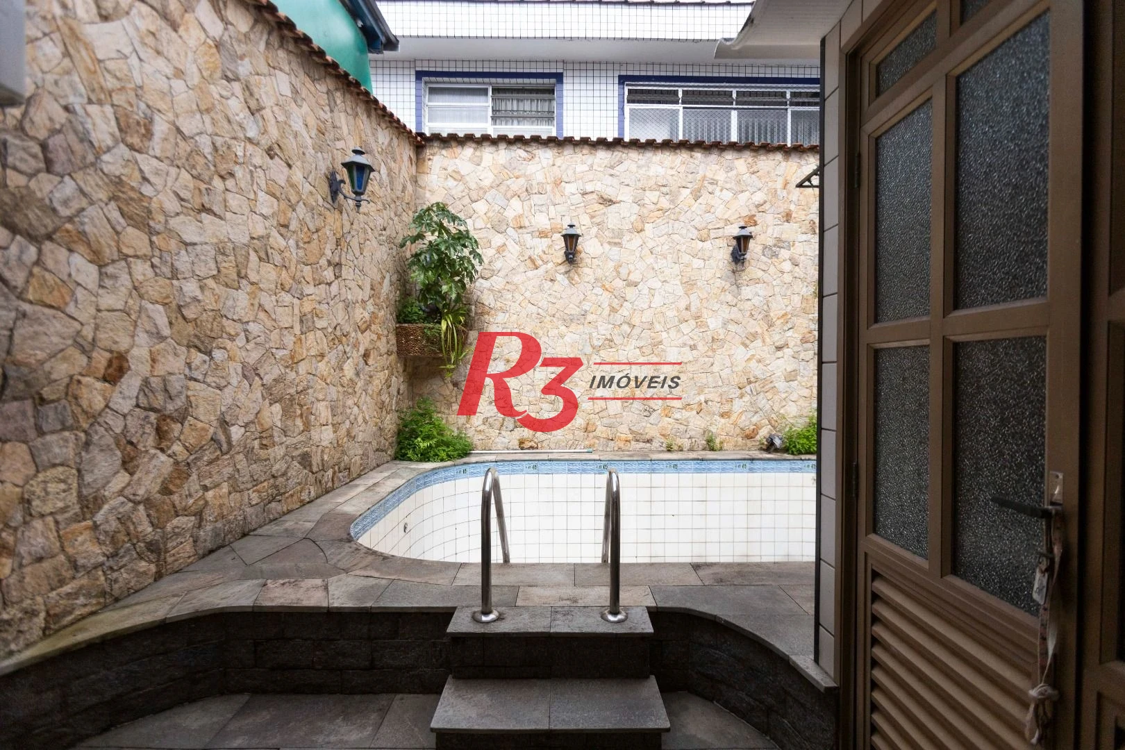 Sobrado com 4 dormitórios, 227 m² - venda por R$ 2.000.000,00 ou aluguel por R$ 9.605,06/mês - Vila Belmiro - Santos/SP
