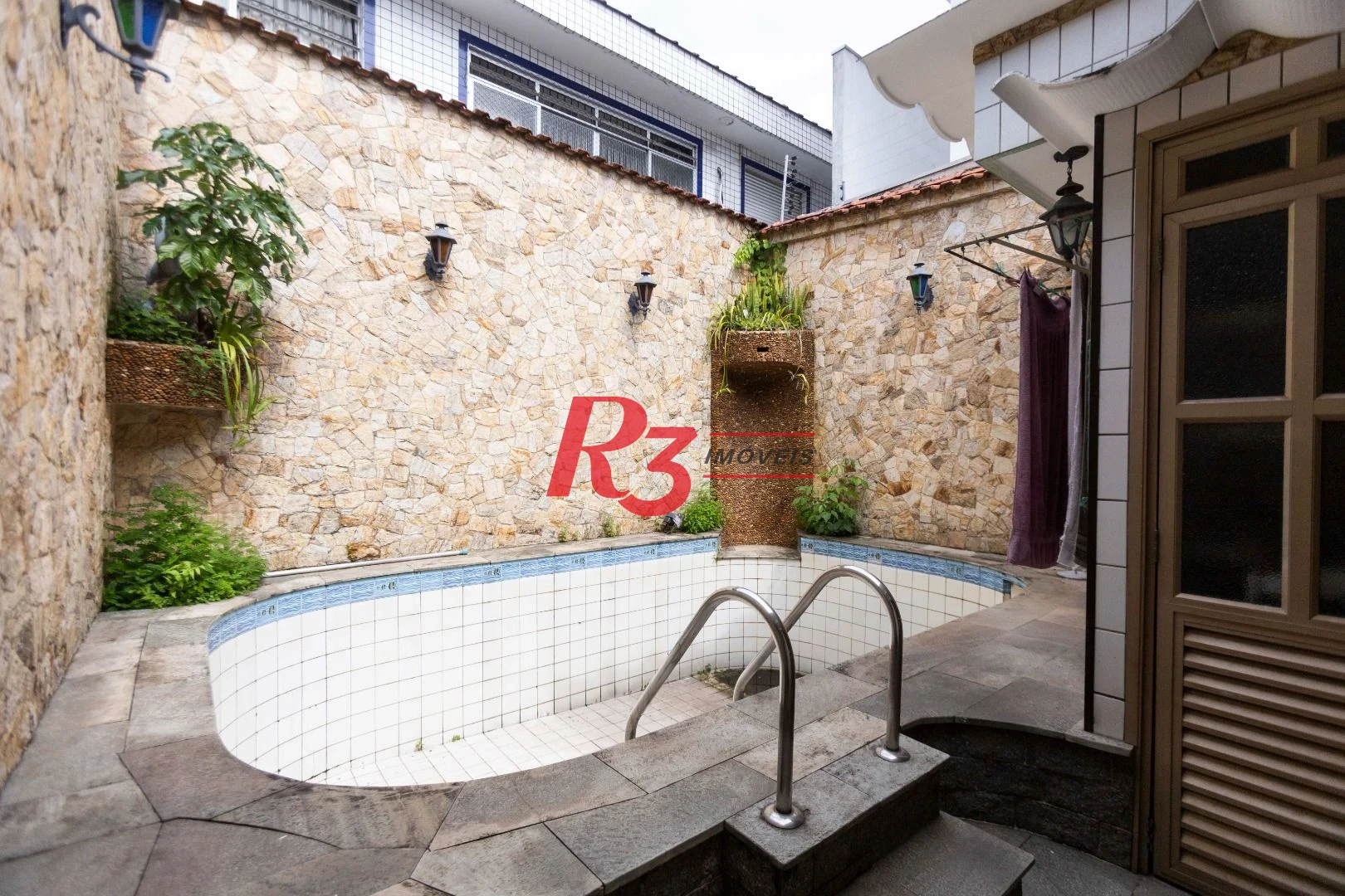Sobrado com 4 dormitórios, 227 m² - venda por R$ 2.000.000,00 ou aluguel por R$ 9.605,06/mês - Vila Belmiro - Santos/SP