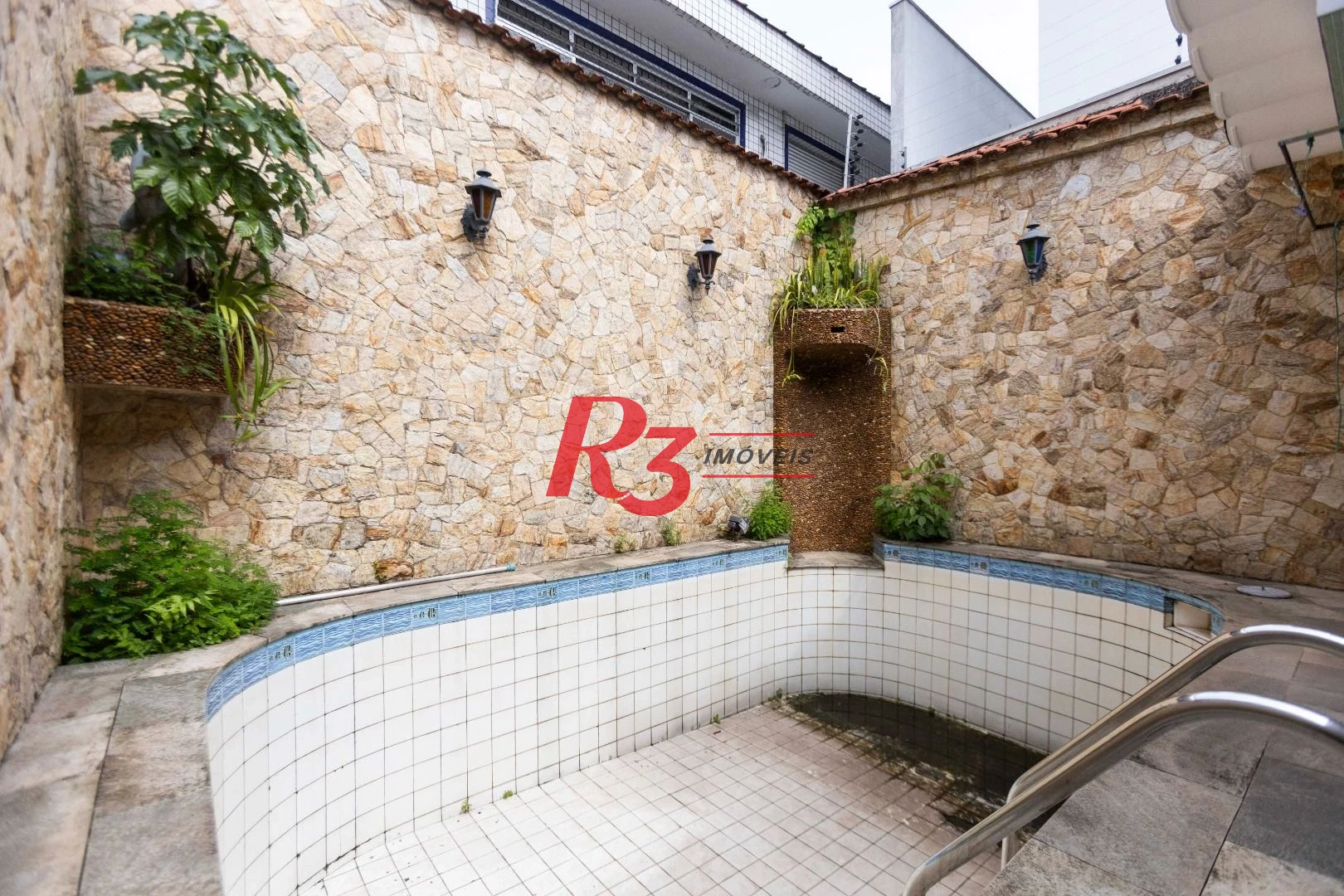 Sobrado com 4 dormitórios, 227 m² - venda por R$ 2.000.000,00 ou aluguel por R$ 9.605,06/mês - Vila Belmiro - Santos/SP