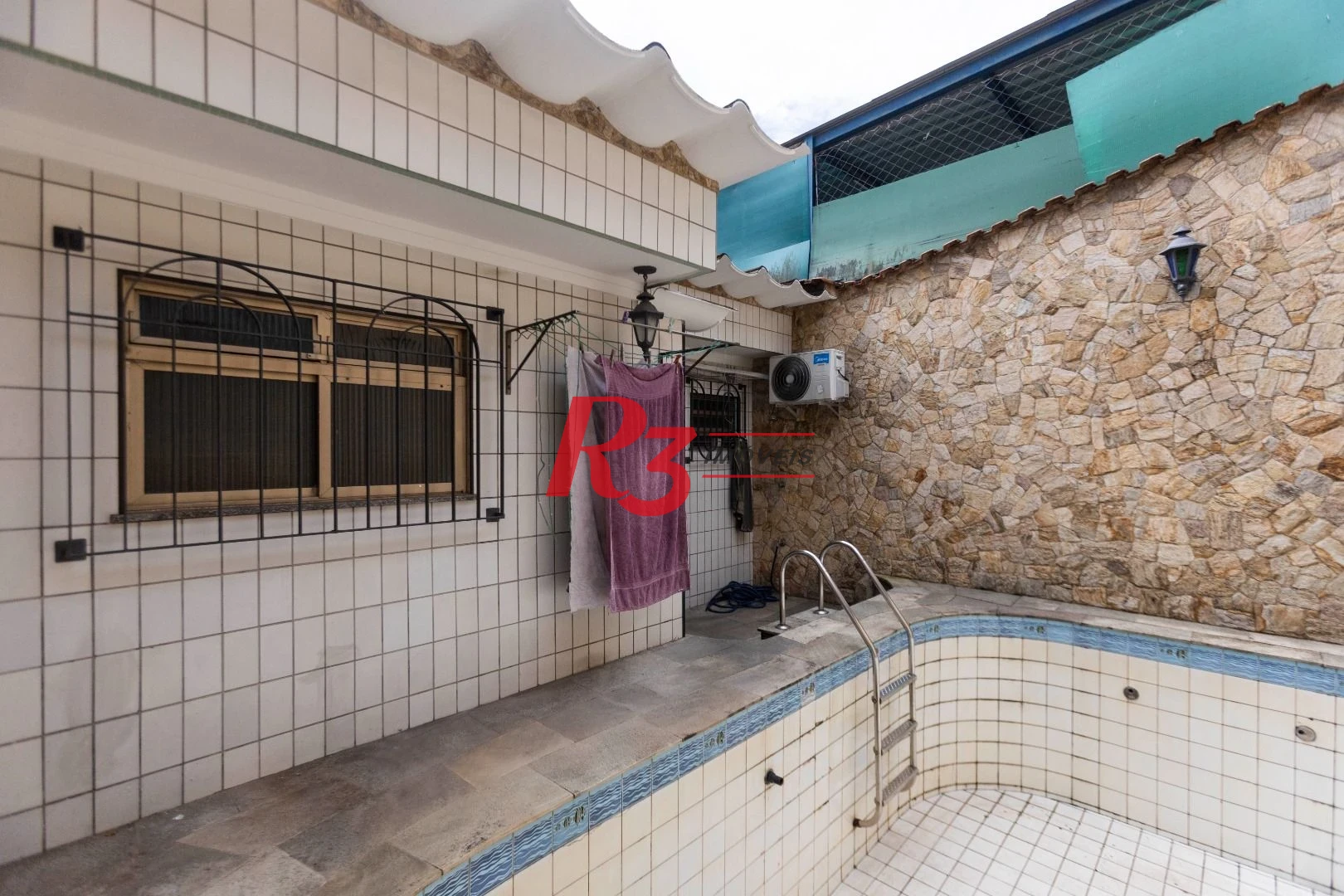Sobrado com 4 dormitórios, 227 m² - venda por R$ 2.000.000,00 ou aluguel por R$ 9.605,06/mês - Vila Belmiro - Santos/SP