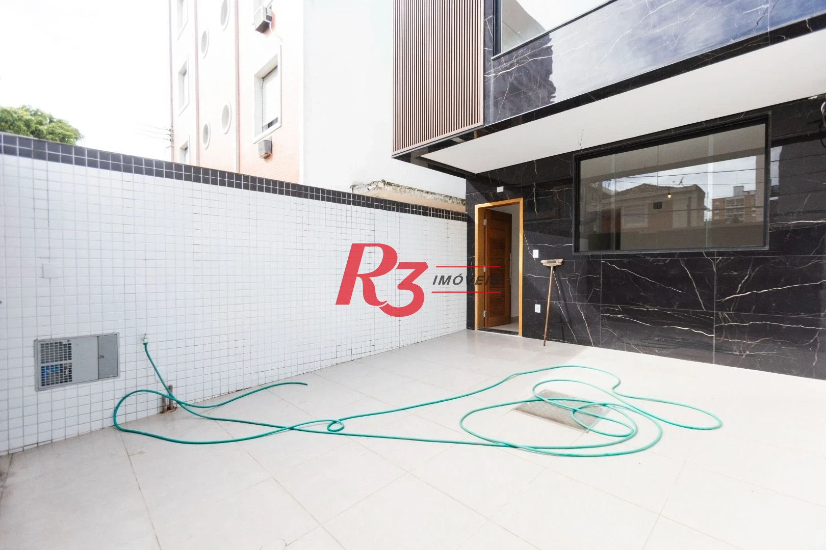 Casa com 3 dormitórios à venda, 150 m² por R$ 1.300.000,00 - Aparecida - Santos/SP