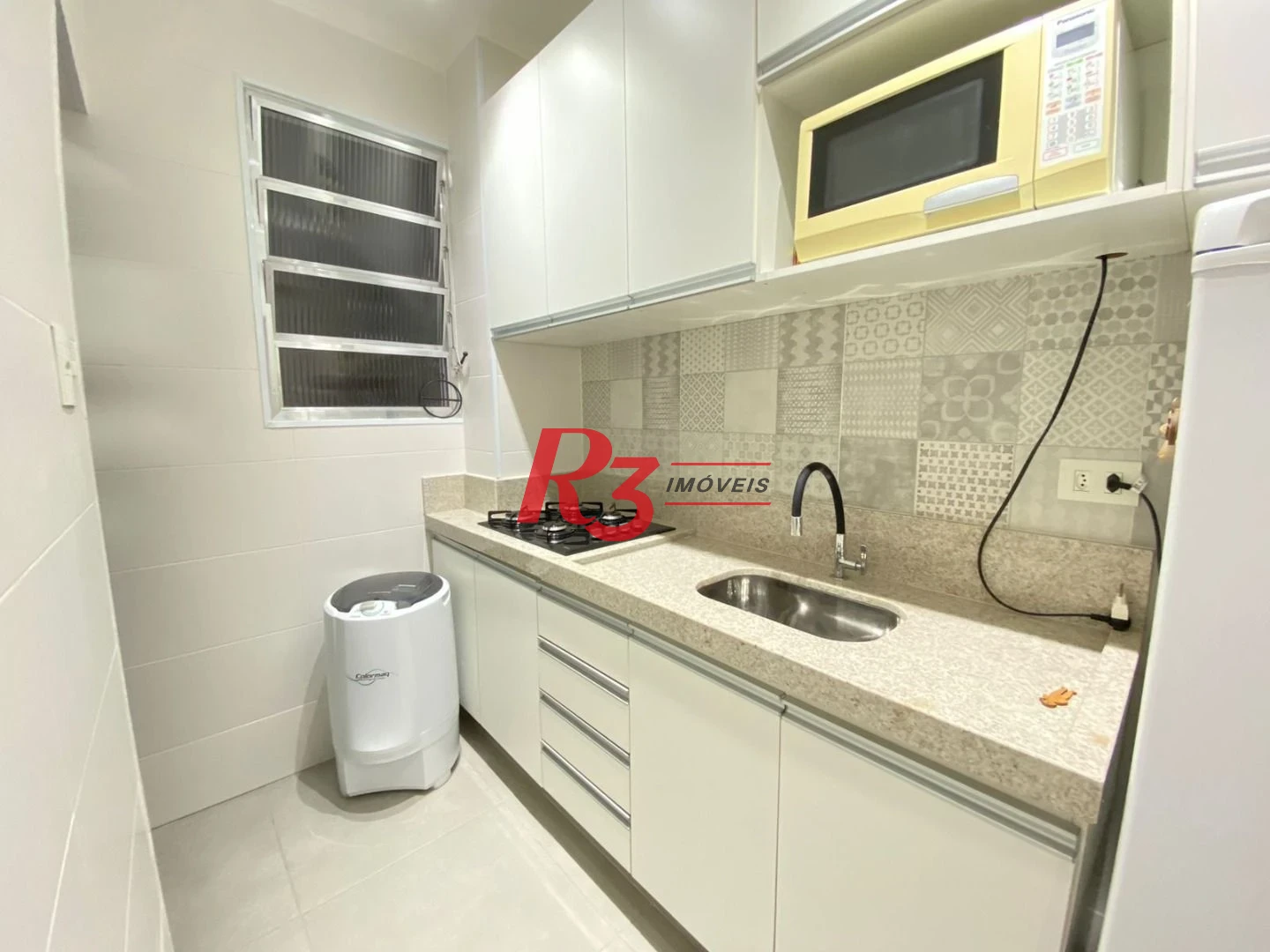 Kitnet com 1 dormitório, 38 m² - venda por R$ 300.000,00 ou aluguel por R$ 3.010,00/mês - Centro - São Vicente/SP