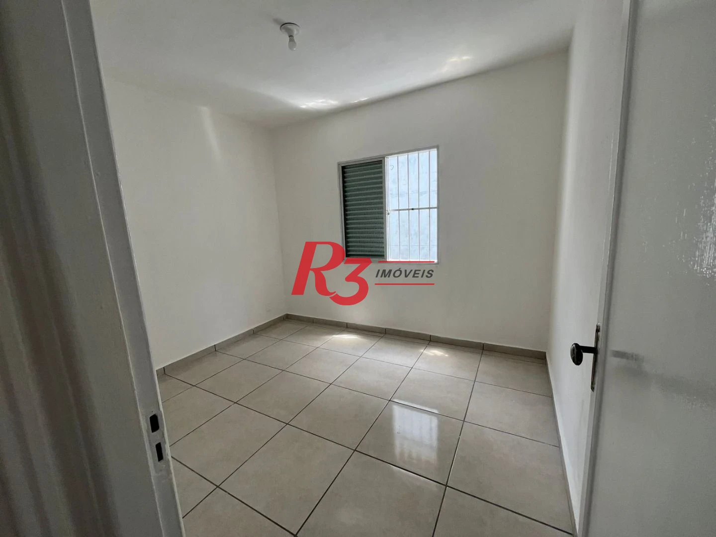 Apartamento com 2 dormitórios à venda, 55 m² por R$ 310.000,00 - Macuco - Santos/SP