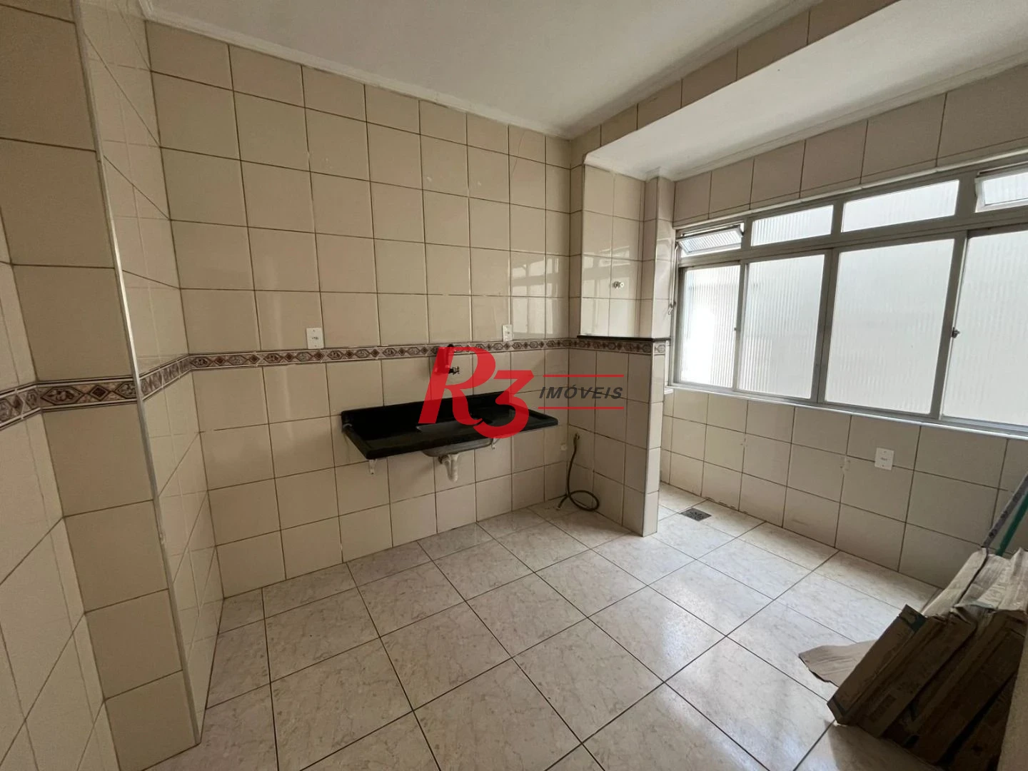 Apartamento com 2 dormitórios à venda, 55 m² por R$ 310.000,00 - Macuco - Santos/SP