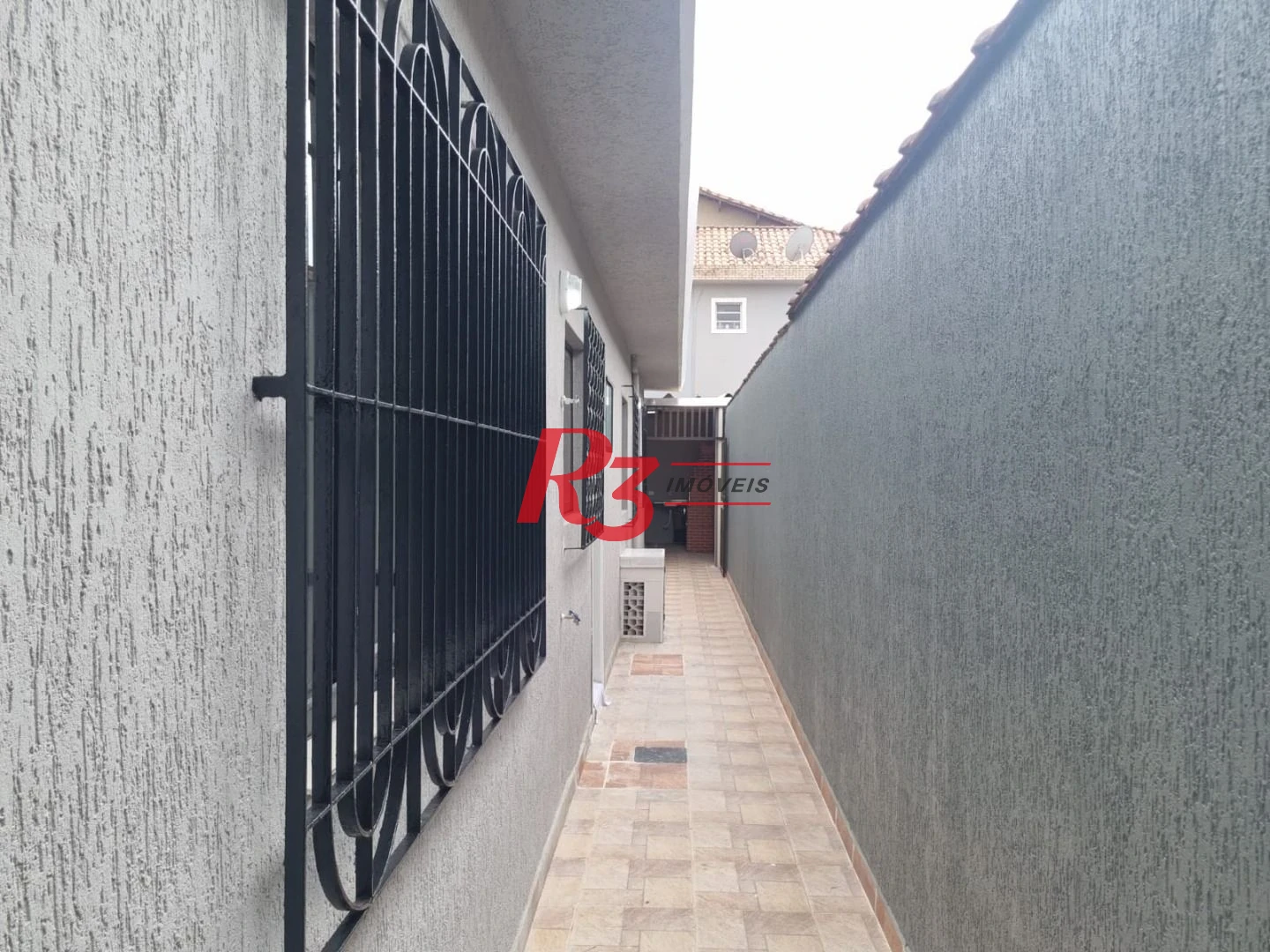 Casa com 3 dormitórios à venda, 150 m² por R$ 500.000,00 - Vila São Jorge - São Vicente/SP