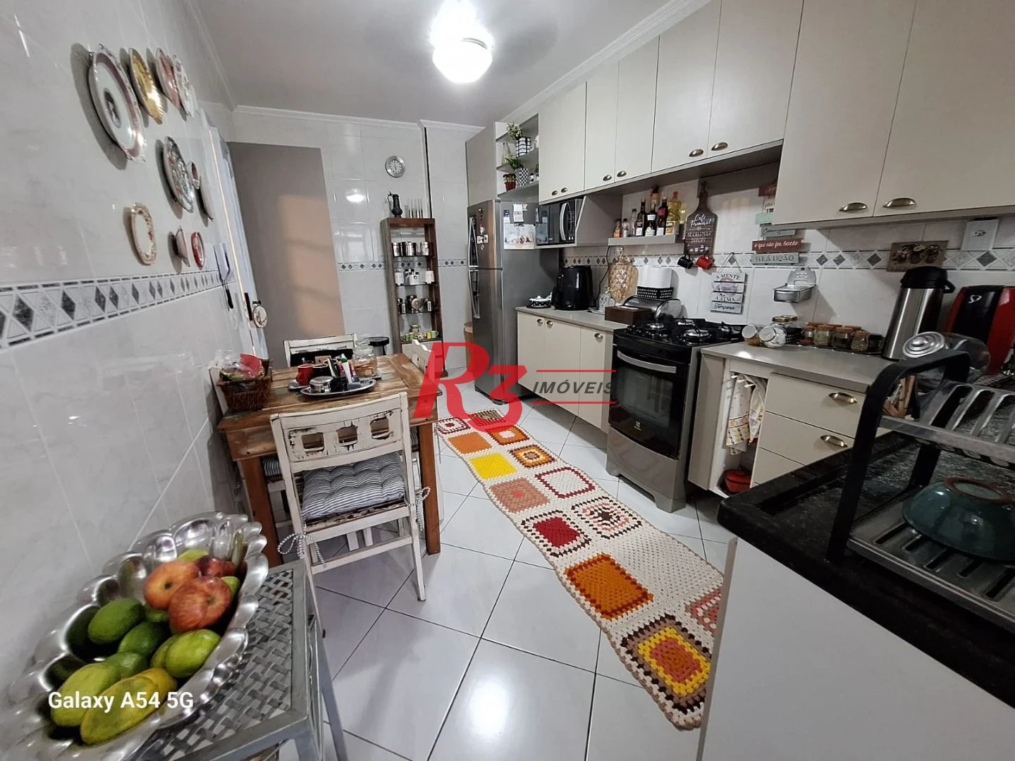 Apartamento com 2 dormitórios à venda, 96 m² por R$ 606.000,00 - Vila Guilhermina - Praia Grande/SP