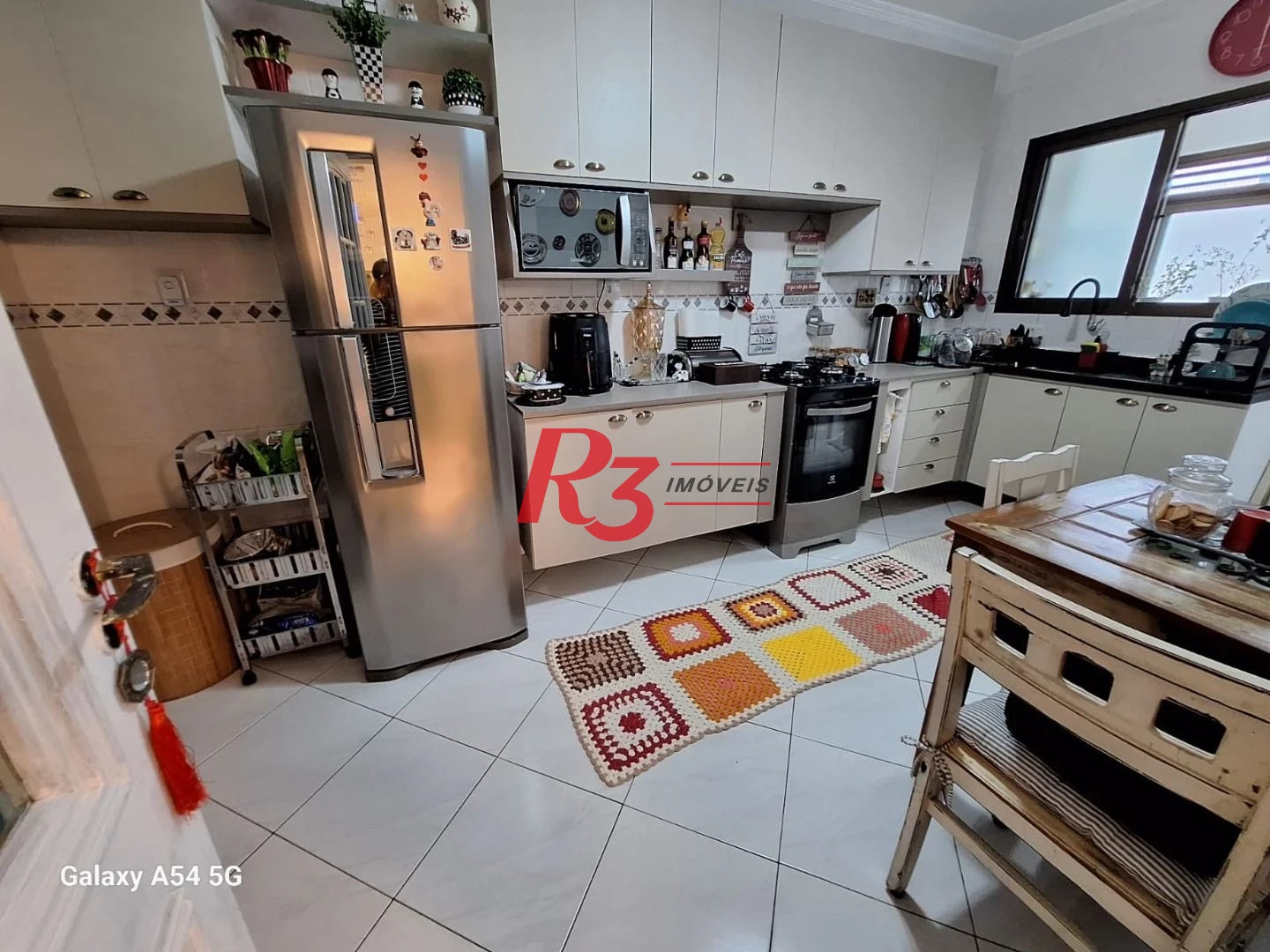 Apartamento com 2 dormitórios à venda, 96 m² por R$ 606.000,00 - Vila Guilhermina - Praia Grande/SP