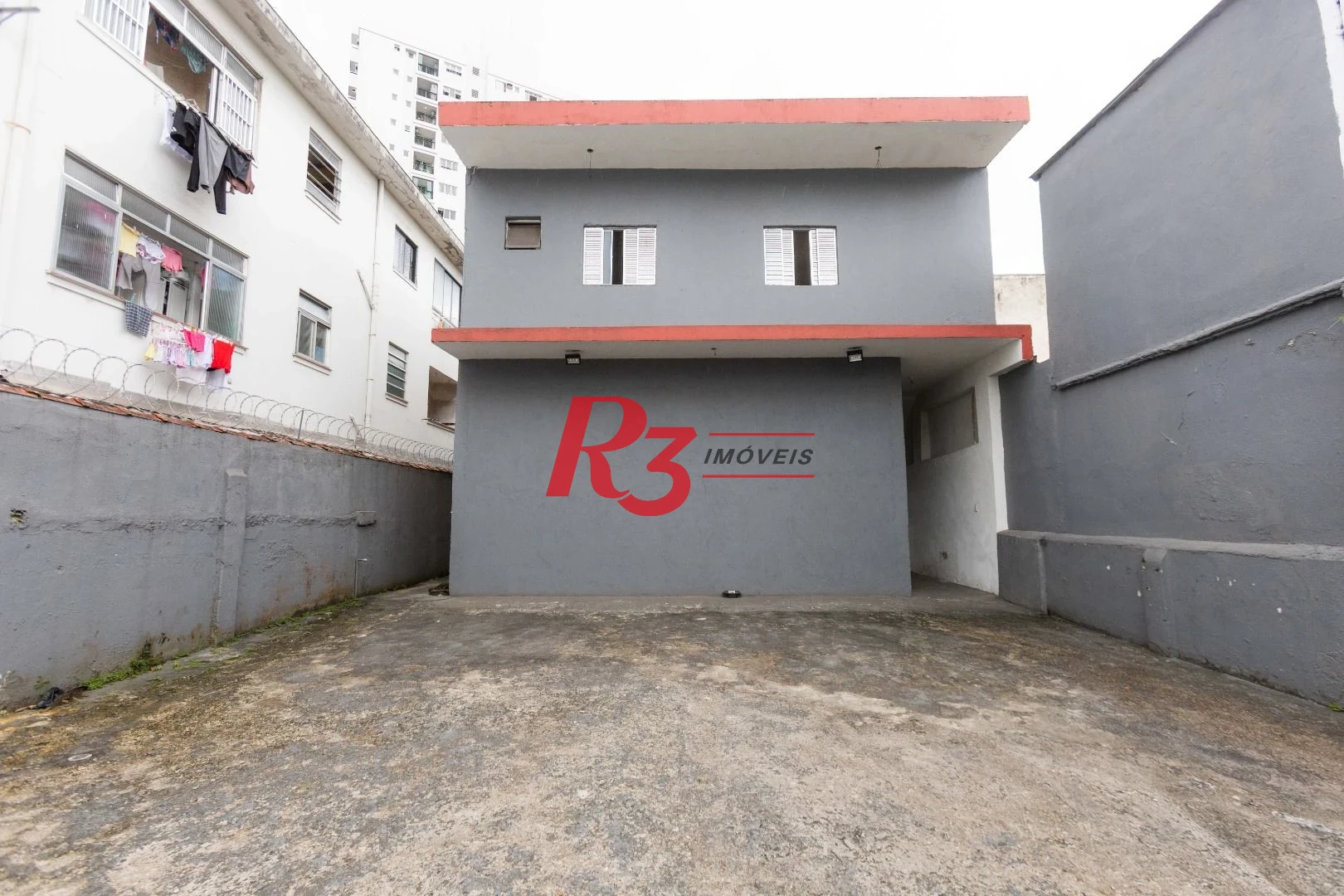 Terreno para alugar, 470 m² por R$ 13.450,00/mês - Macuco - Santos/SP