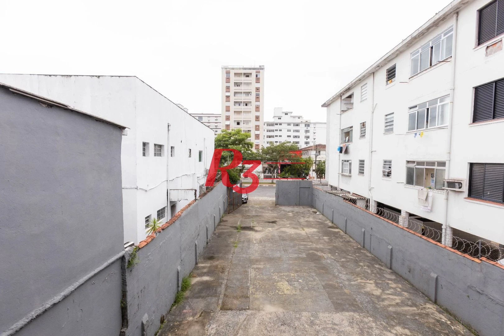 Terreno para alugar, 470 m² por R$ 13.450,00/mês - Macuco - Santos/SP