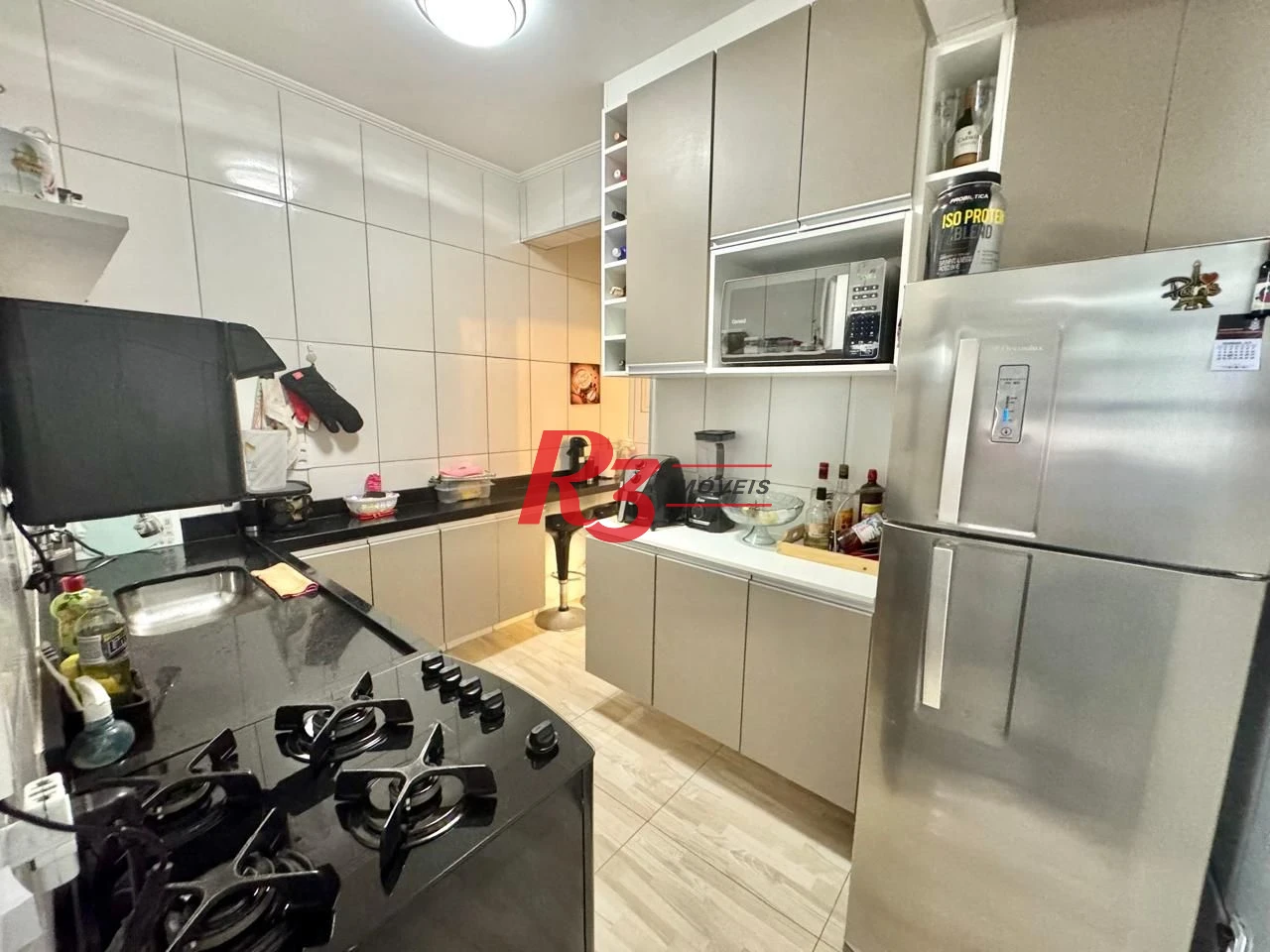 Apartamento com 2 dormitórios à venda, 65 m² por R$ 350.000,00 - Itararé - São Vicente/SP