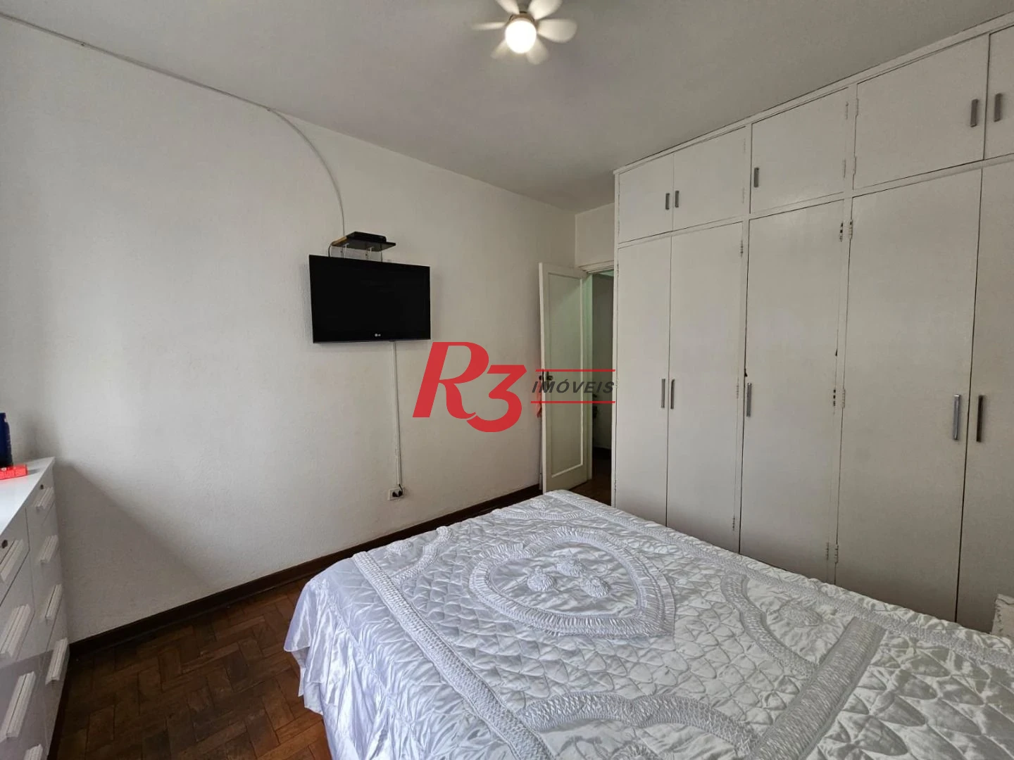 Apartamento com 1 dormitório para alugar, 65 m² por R$ 3.000,00/mês - Gonzaga - Santos/SP