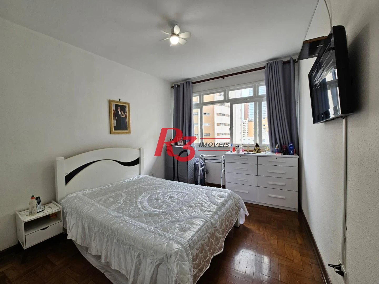 Apartamento com 1 dormitório para alugar, 65 m² por R$ 3.000,00/mês - Gonzaga - Santos/SP