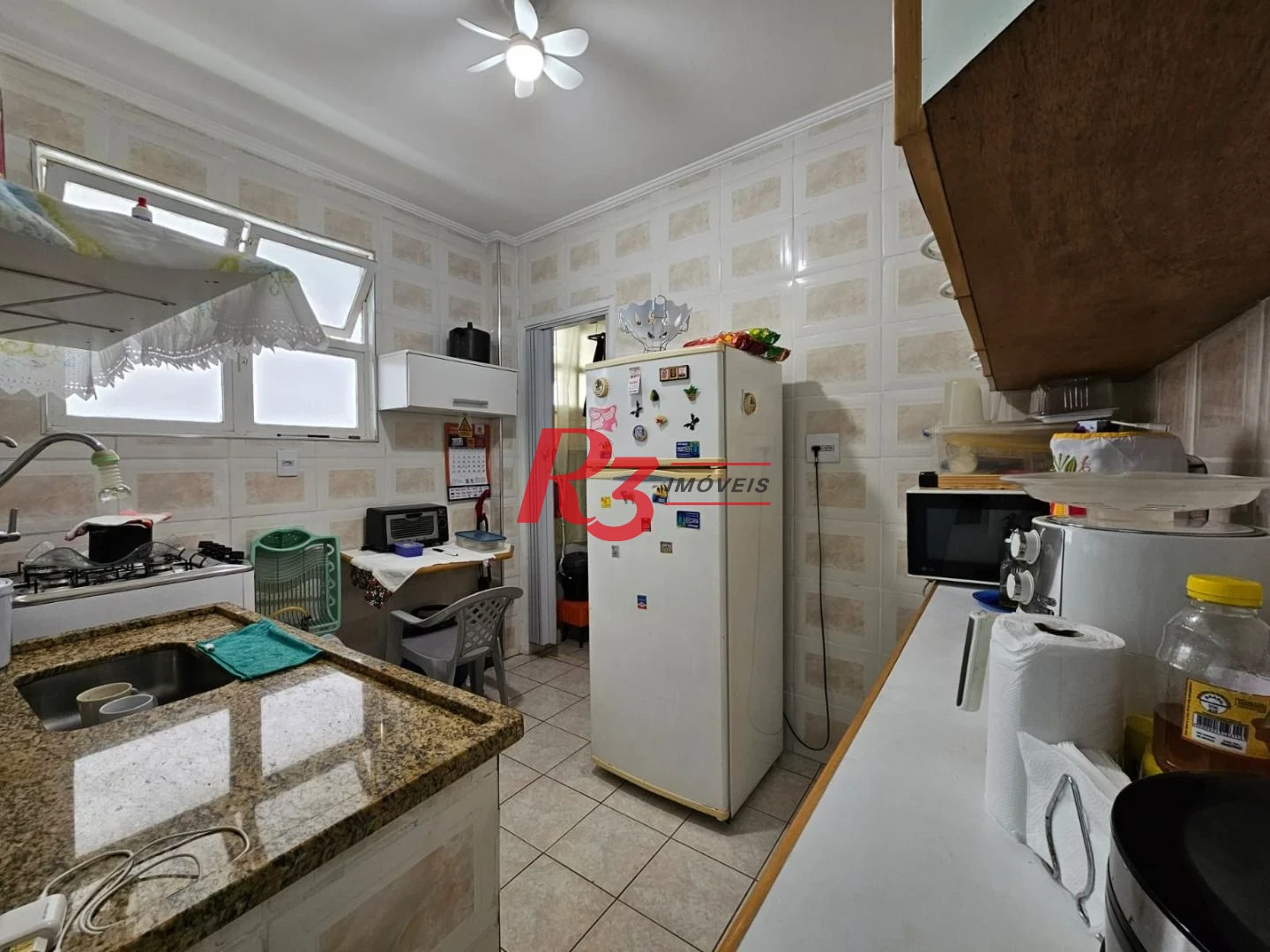 Apartamento com 1 dormitório para alugar, 65 m² por R$ 3.000,00/mês - Gonzaga - Santos/SP