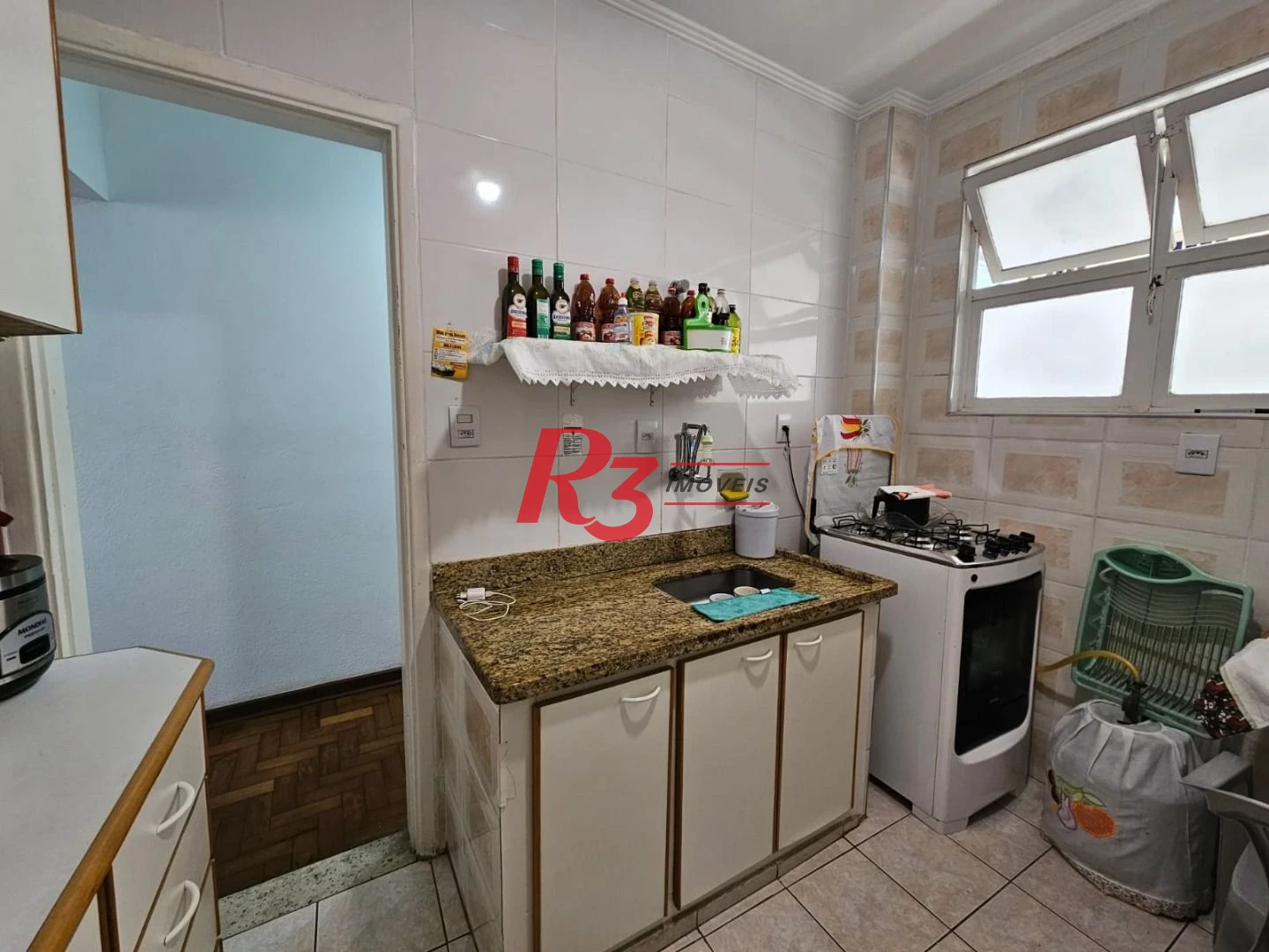 Apartamento com 1 dormitório para alugar, 65 m² por R$ 3.000,00/mês - Gonzaga - Santos/SP