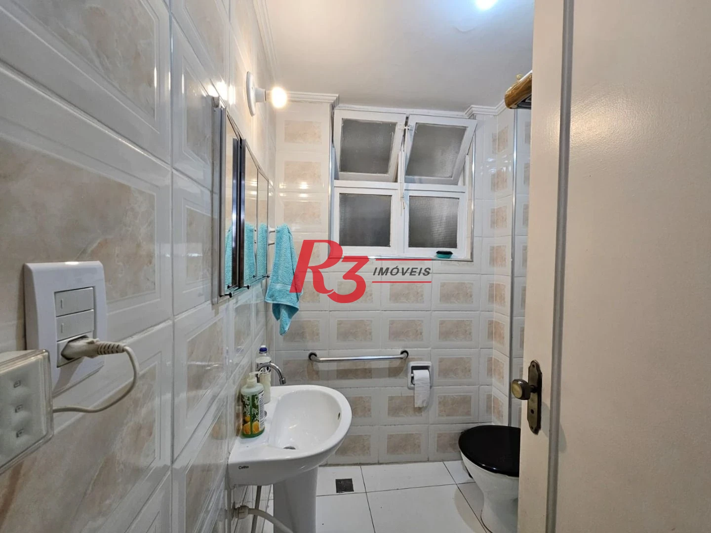 Apartamento com 1 dormitório para alugar, 65 m² por R$ 3.000,00/mês - Gonzaga - Santos/SP