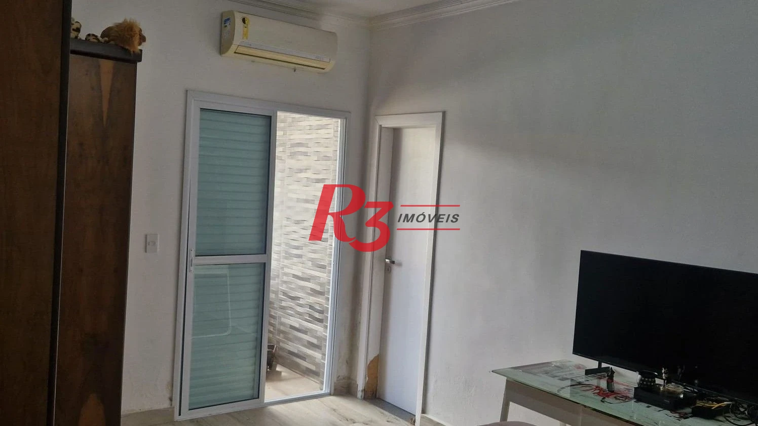 Casa com 3 dormitórios à venda, 385 m² por R$ 1.300.000,00 - Vila Guilhermina - Praia Grande/SP