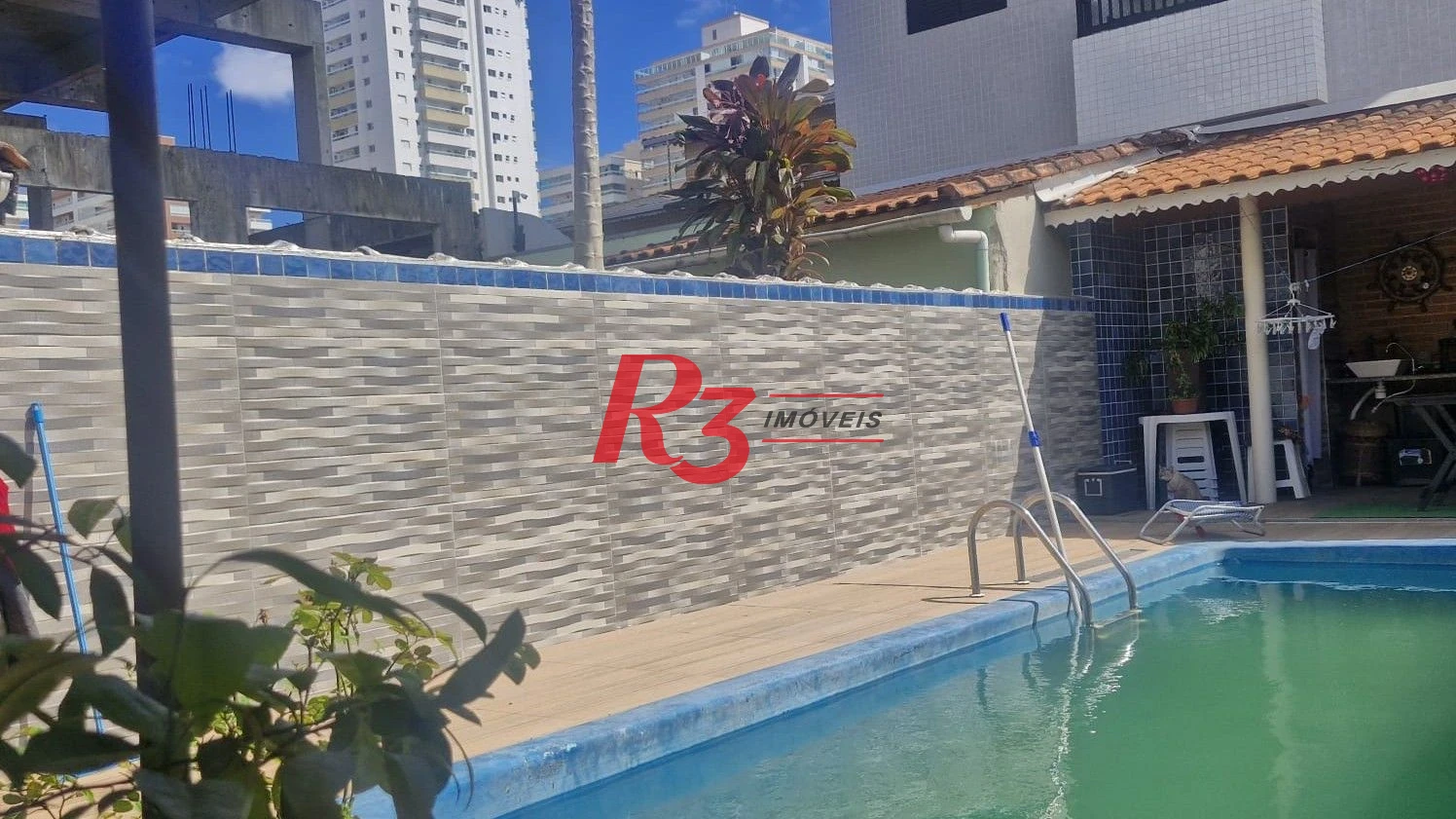 Casa com 3 dormitórios à venda, 385 m² por R$ 1.300.000,00 - Vila Guilhermina - Praia Grande/SP