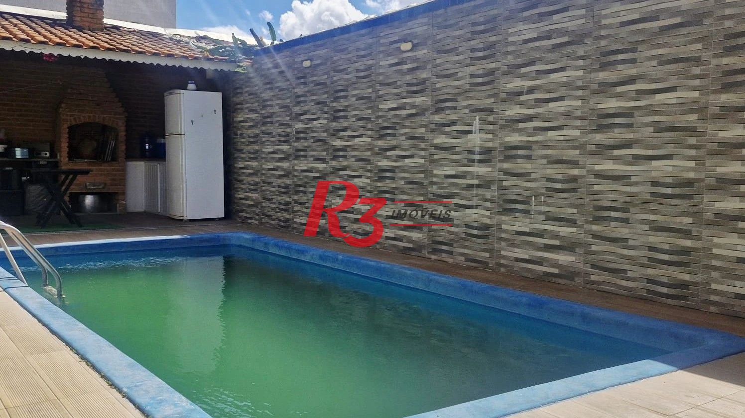 Casa com 3 dormitórios à venda, 385 m² por R$ 1.300.000,00 - Vila Guilhermina - Praia Grande/SP