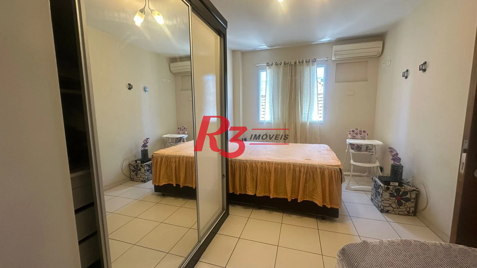 Sobrado com 3 dormitórios à venda, 176 m² por R$ 1.650.000,00 - Campo Grande - Santos/SP