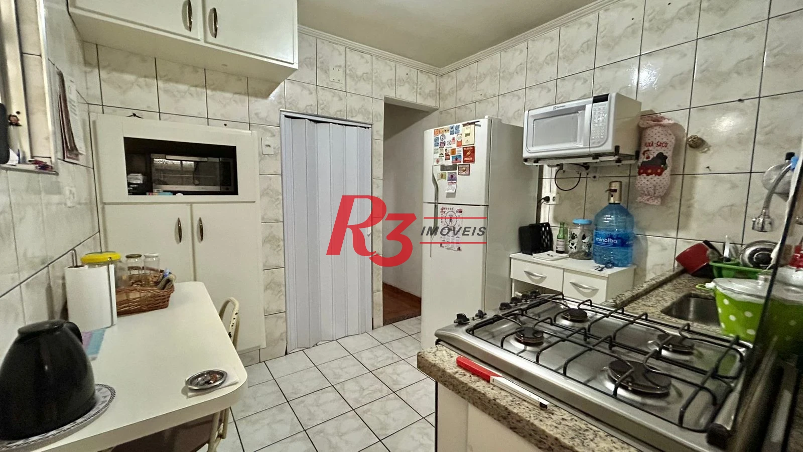 Sobrado com 3 dormitórios à venda, 121 m² por R$ 480.000,00 - Macuco - Santos/SP